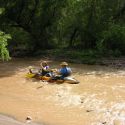 Navigating the Santa Cruz River by boat
